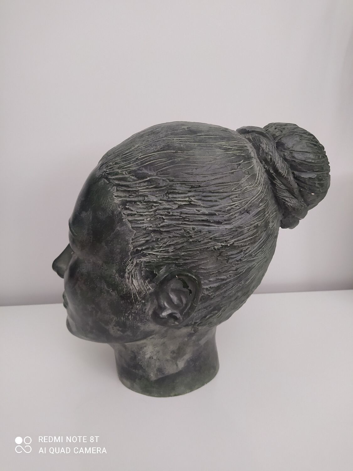 Sculpture face woman in plaster