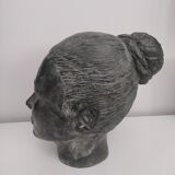Sculpture face woman in plaster