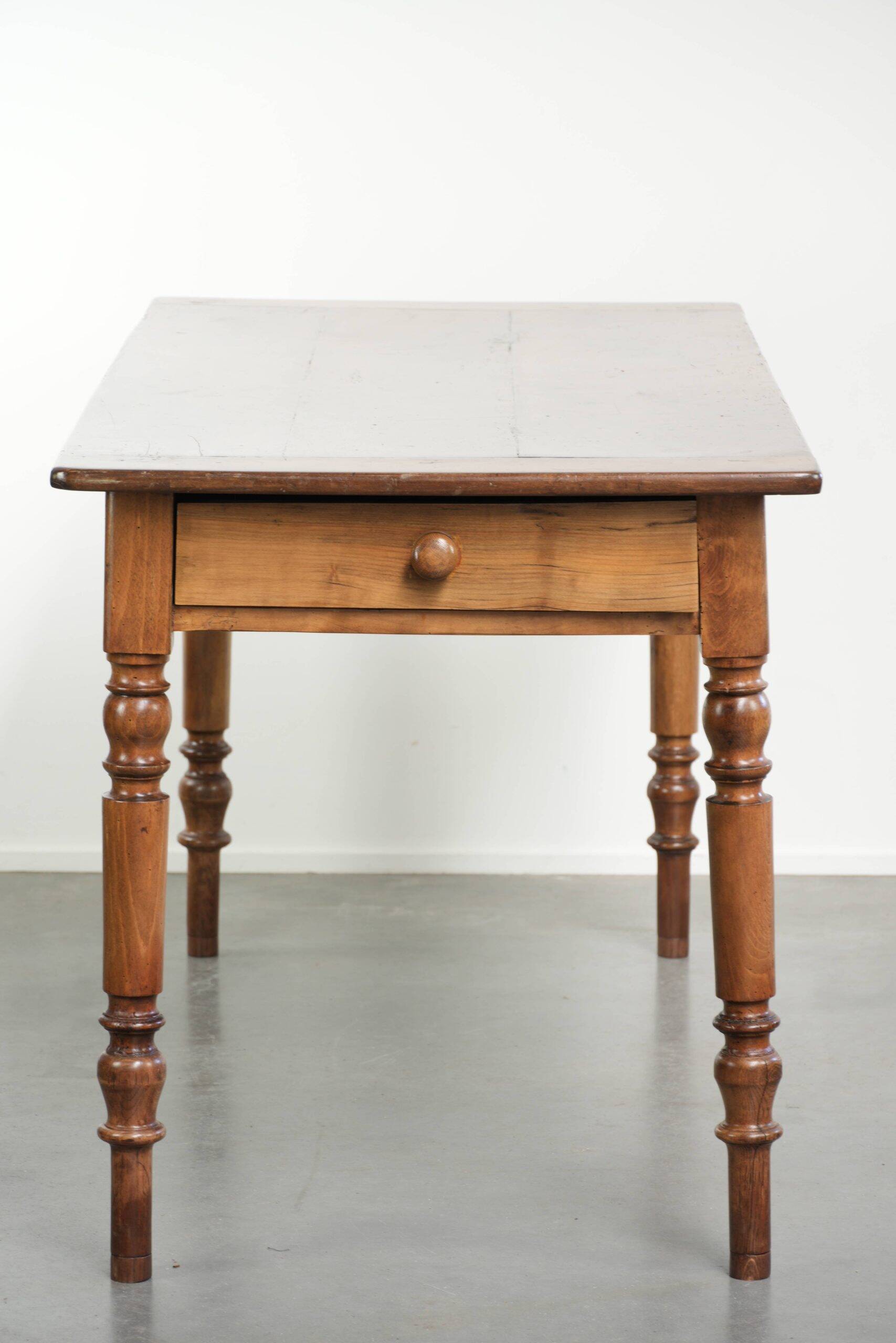 Antique French cherry wood dining table from the 19th century