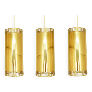 Set of 3 perforated brass cylindrical pendant lamps, Sweden 1960's