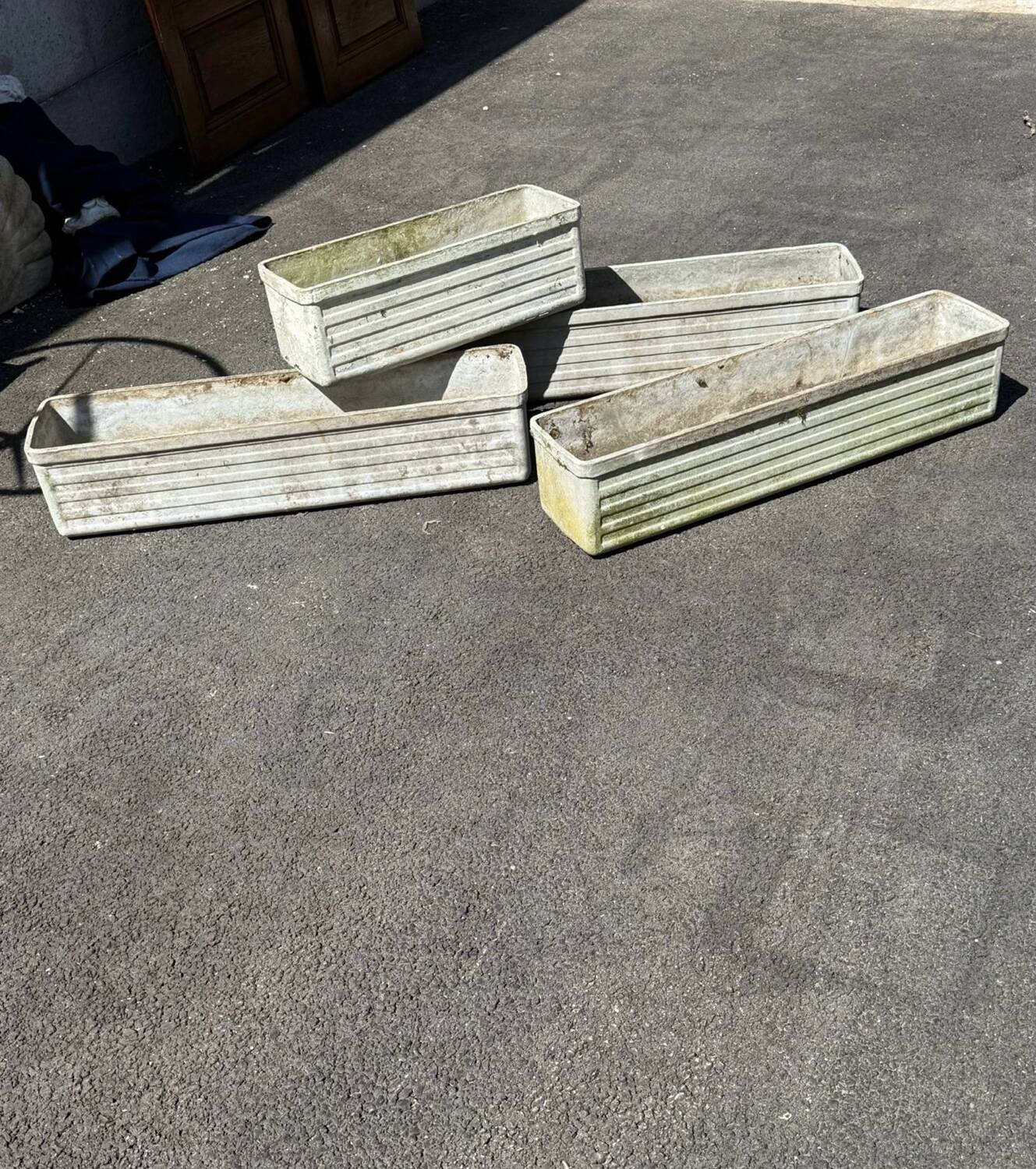 Set of 4 fibreglass planters by Willy Guhl