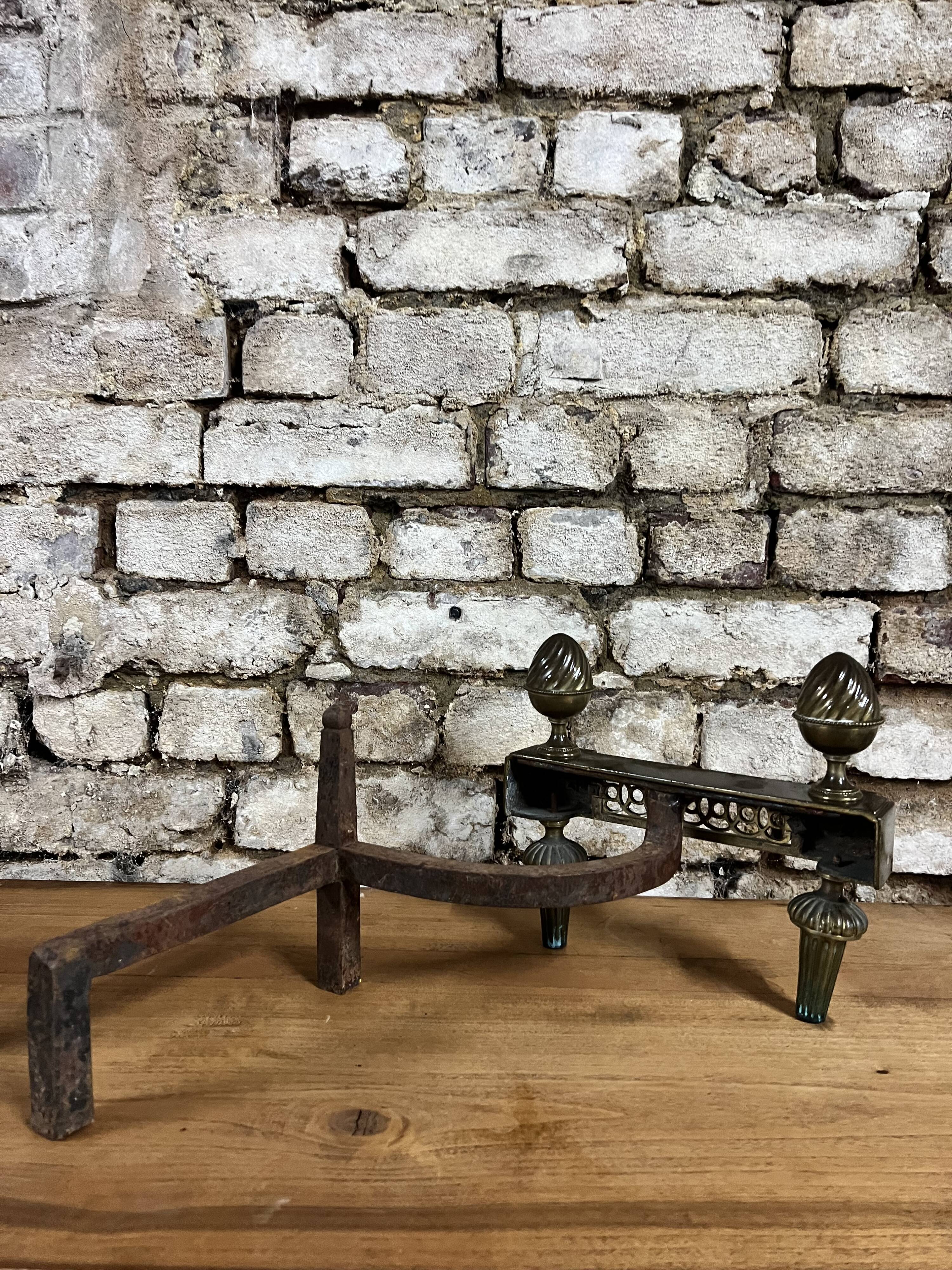 Pair of bronze andirons stamped bouhon frères in louis xvi style