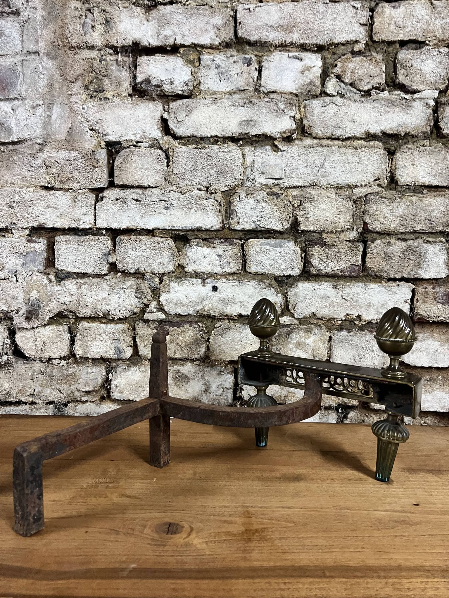 Pair of bronze andirons stamped bouhon frères in louis xvi style