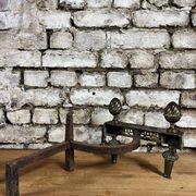Pair of bronze andirons stamped bouhon frères in louis xvi style