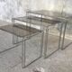 Suite of 3 space-age nesting tables stainless steel and glass - design 1970