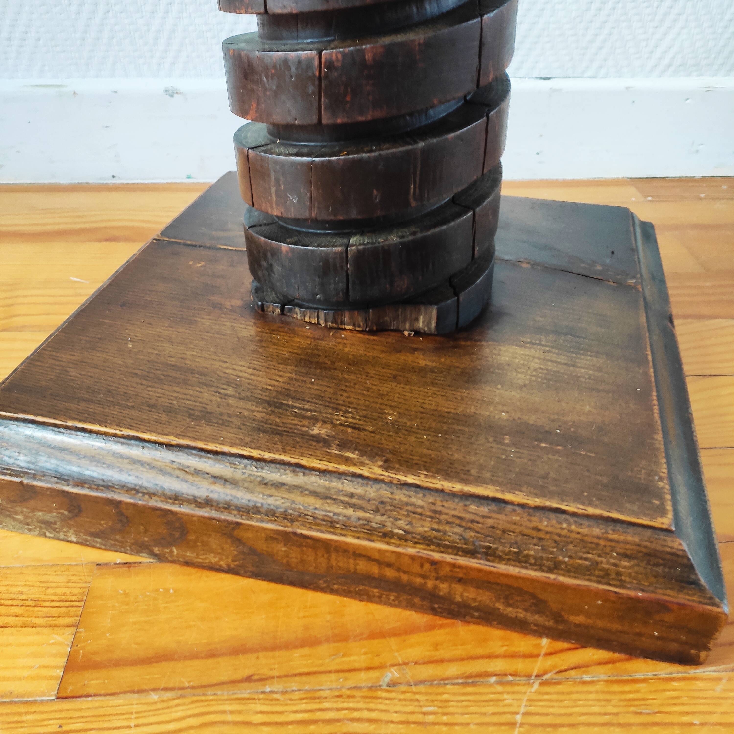 Brutalist column – old Burgundy press screw