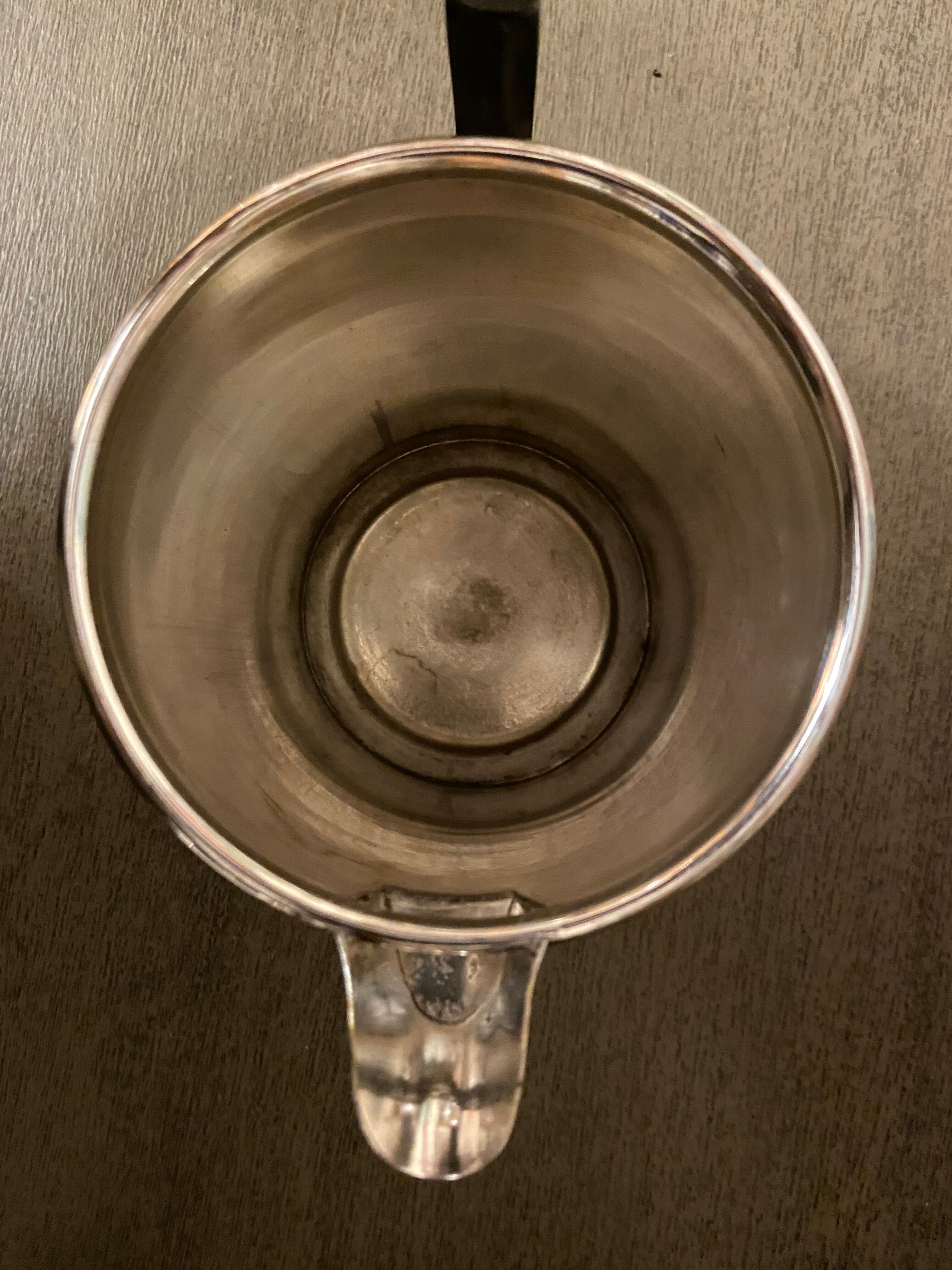 Old silver metal piston coffee maker