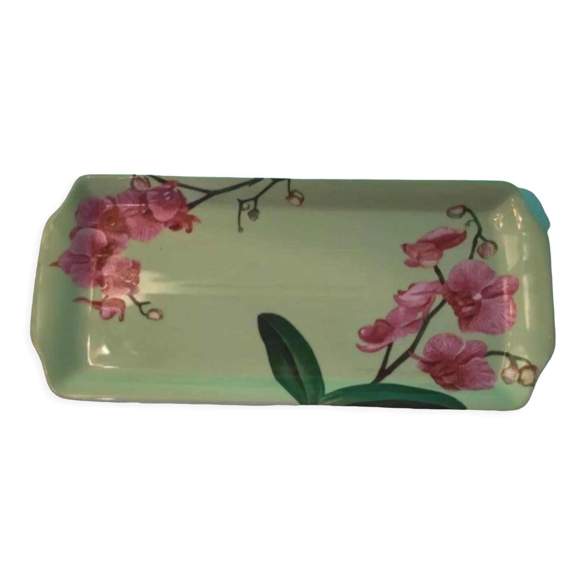 Cake dish with fuchsia orchids
