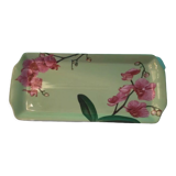 Cake dish with fuchsia orchids