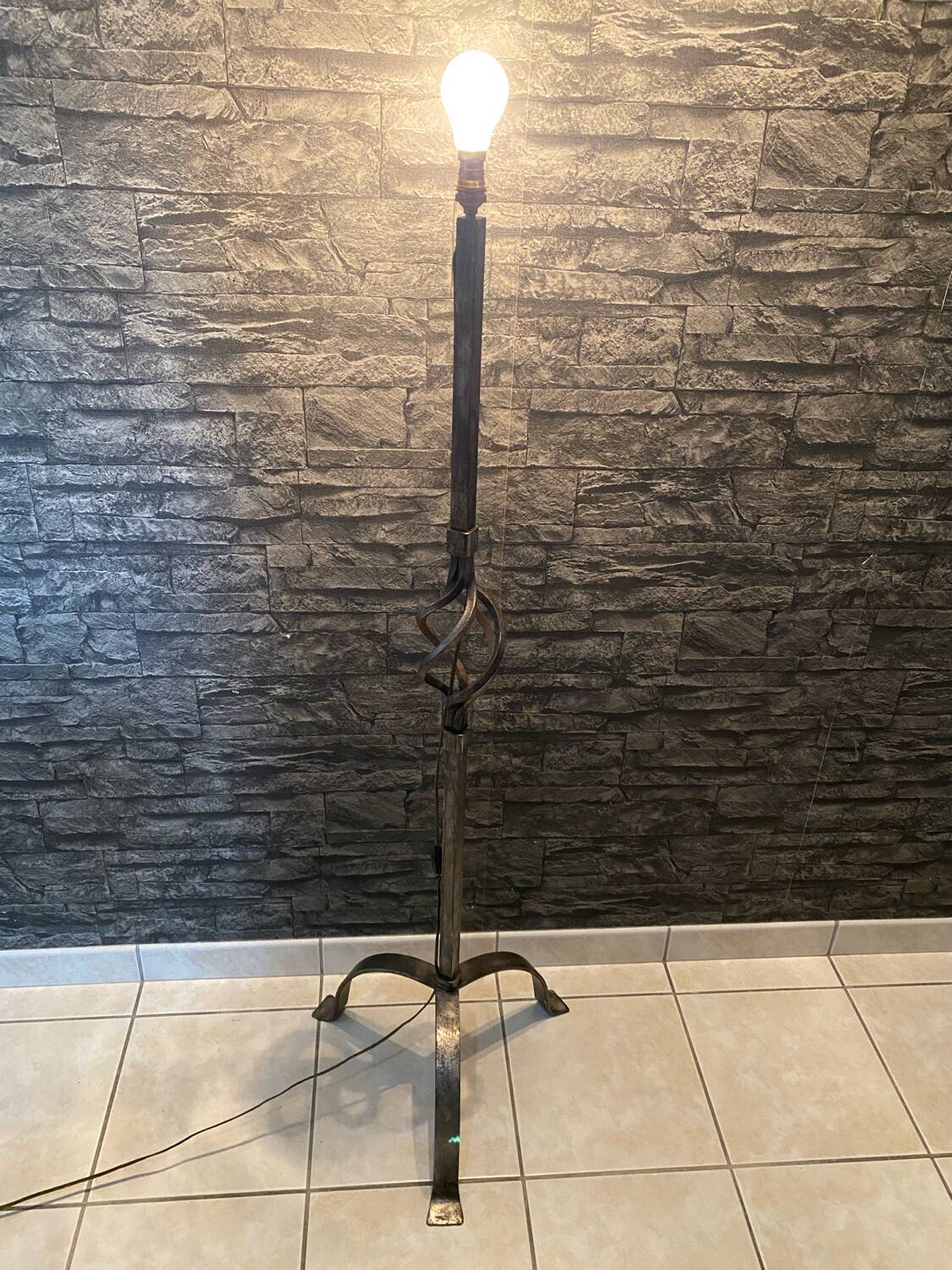 Brutalist tripod floor lamp in wrought iron