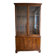 Classic English display cabinet in wood with glass doors.