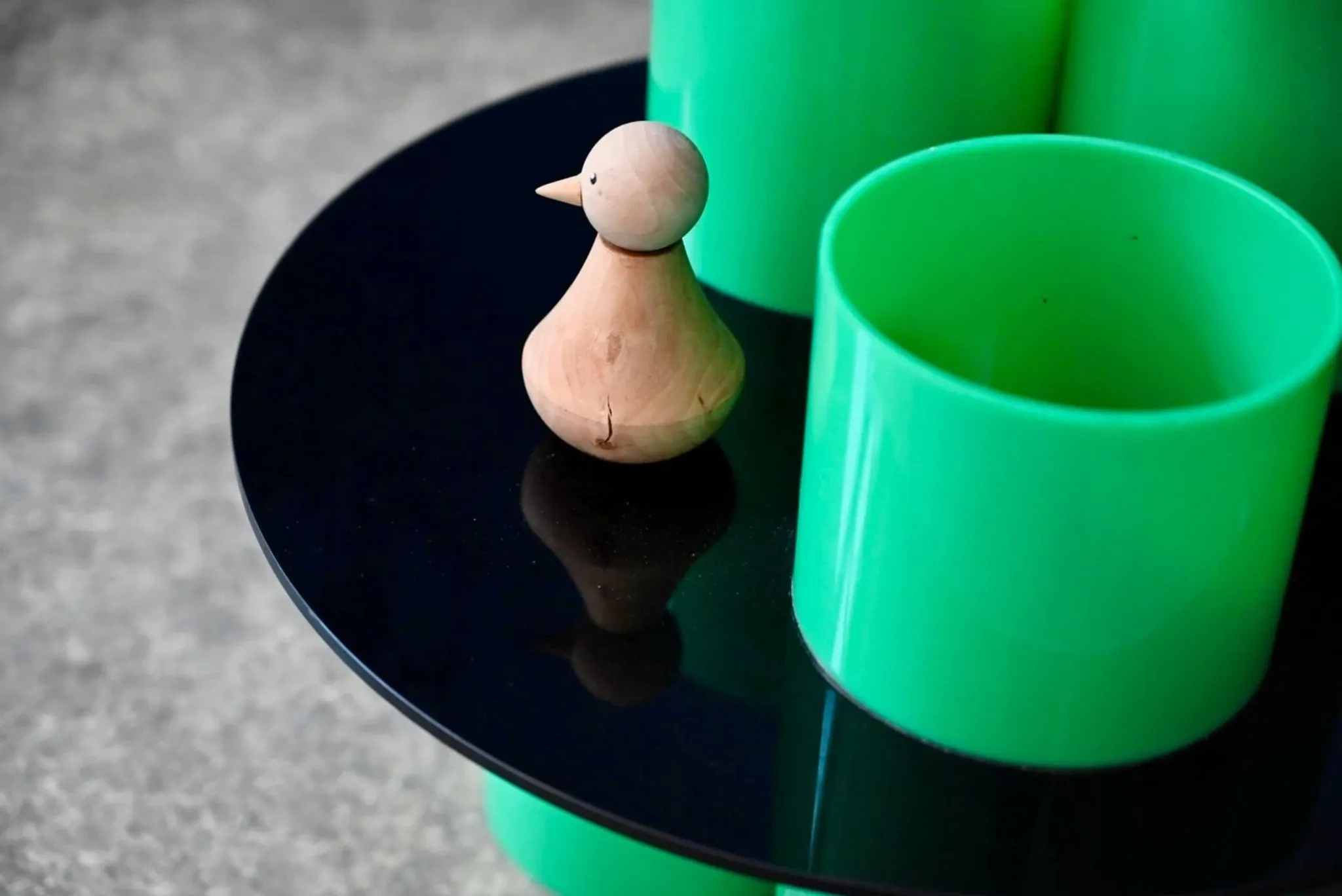 Green plexiglass coffee table in Memphis design style from the 1980s.