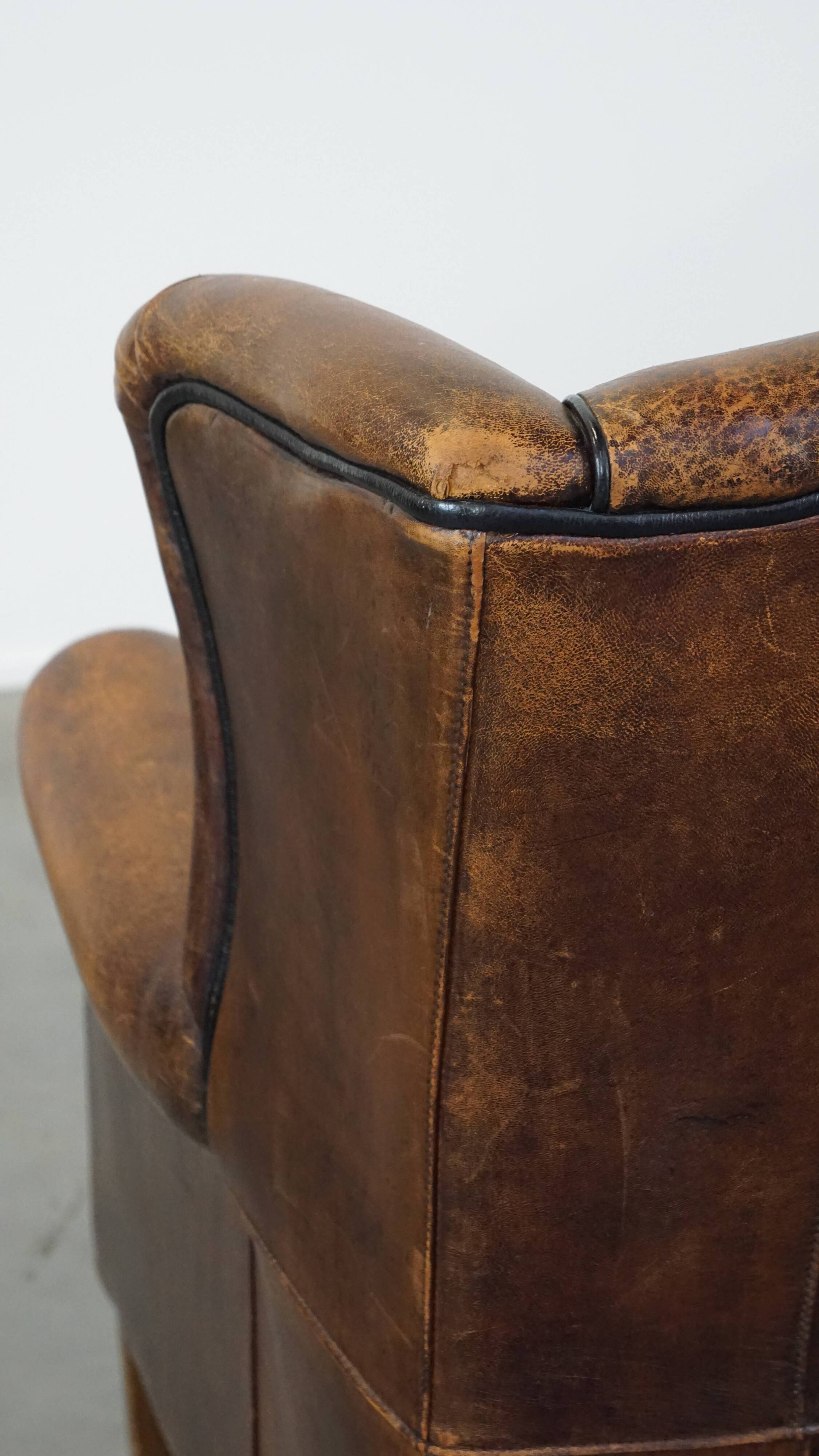 Sheep leather wing chair with patina