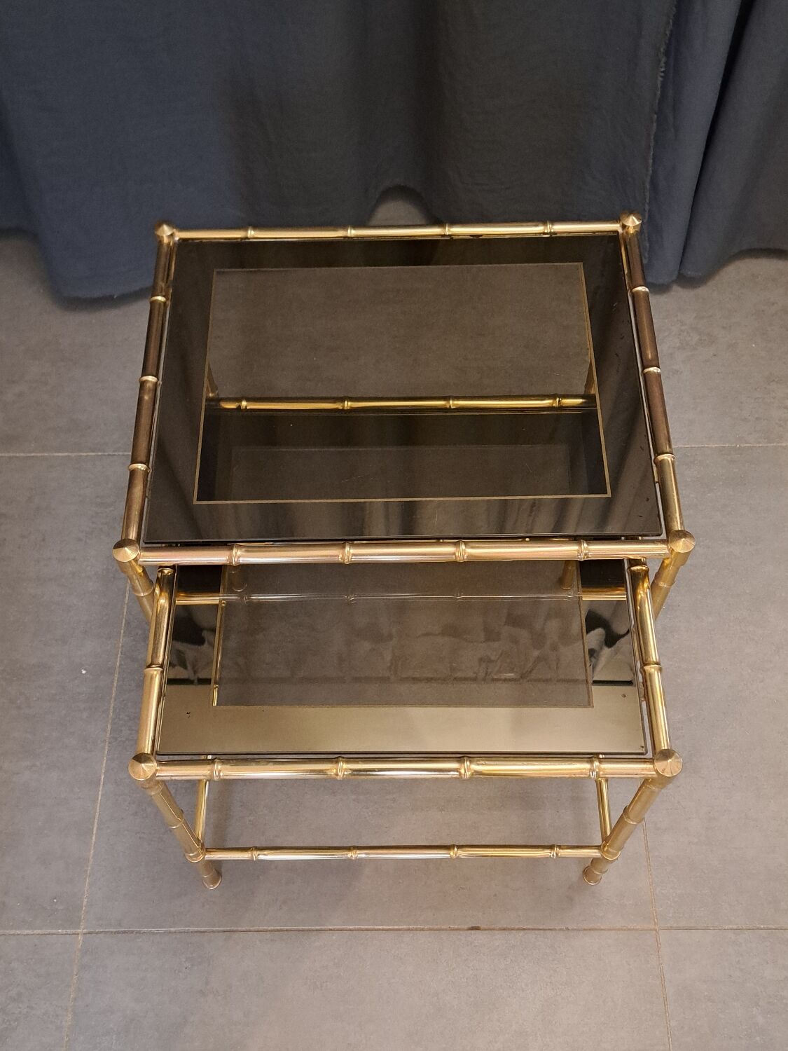 Nesting bamboo tables with gold-plated brass trim