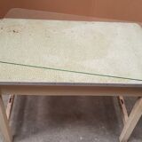 Old desk table with glass plate and drawer