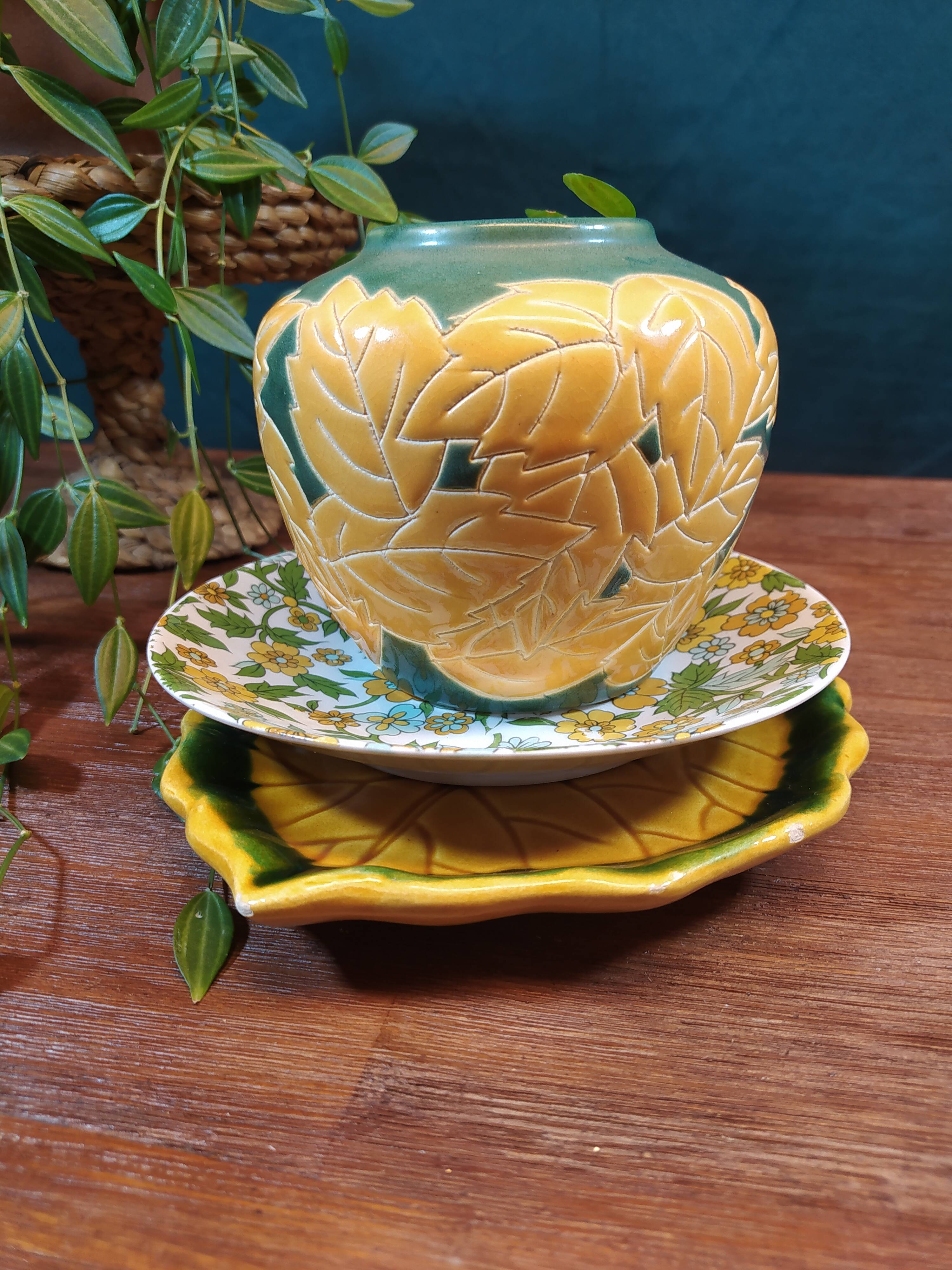 Ceramic ball vase with yellow and green leaf patterns