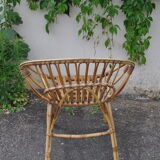 Rattan basket armchair.