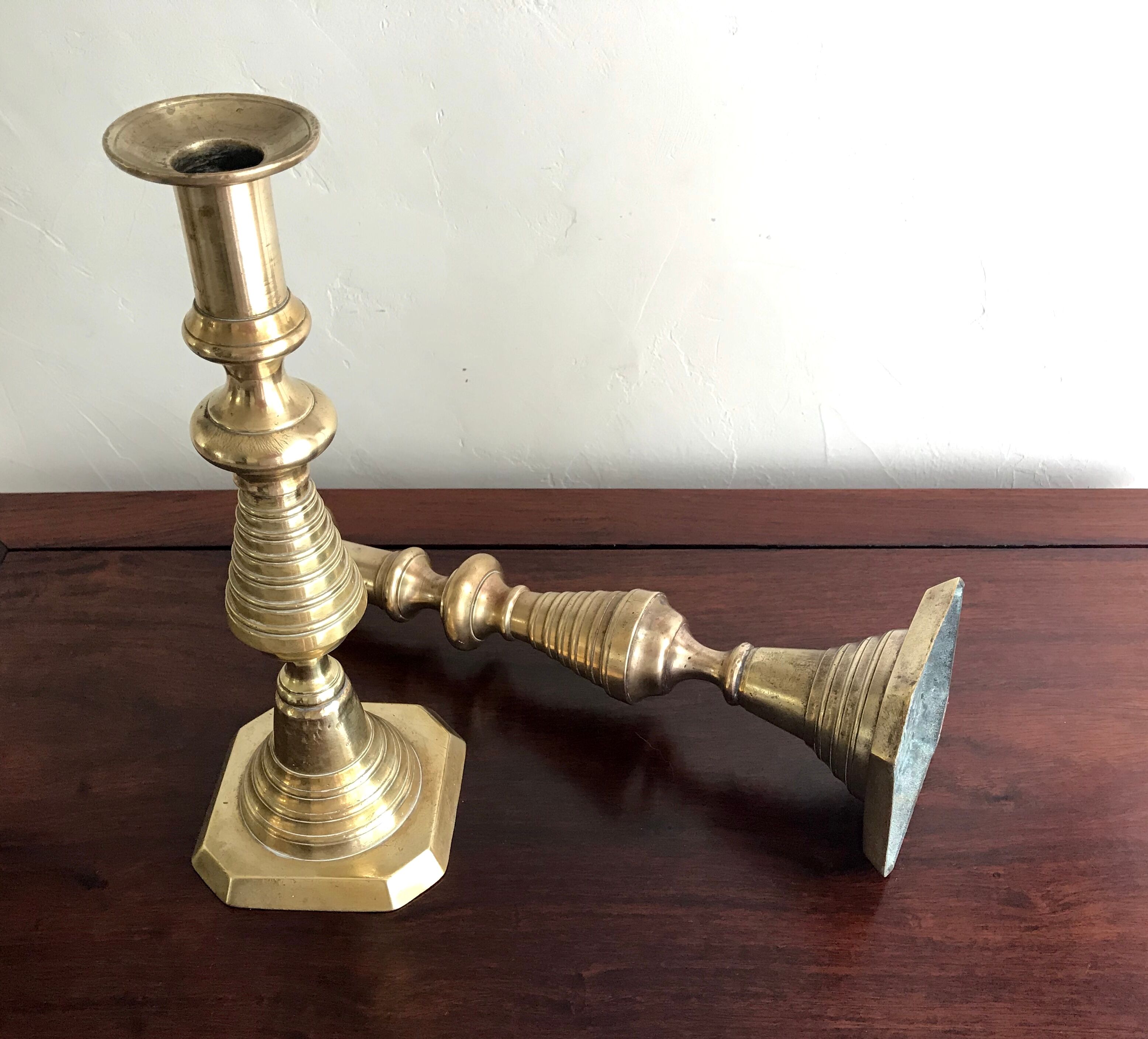 Pair of old brass candlesticks