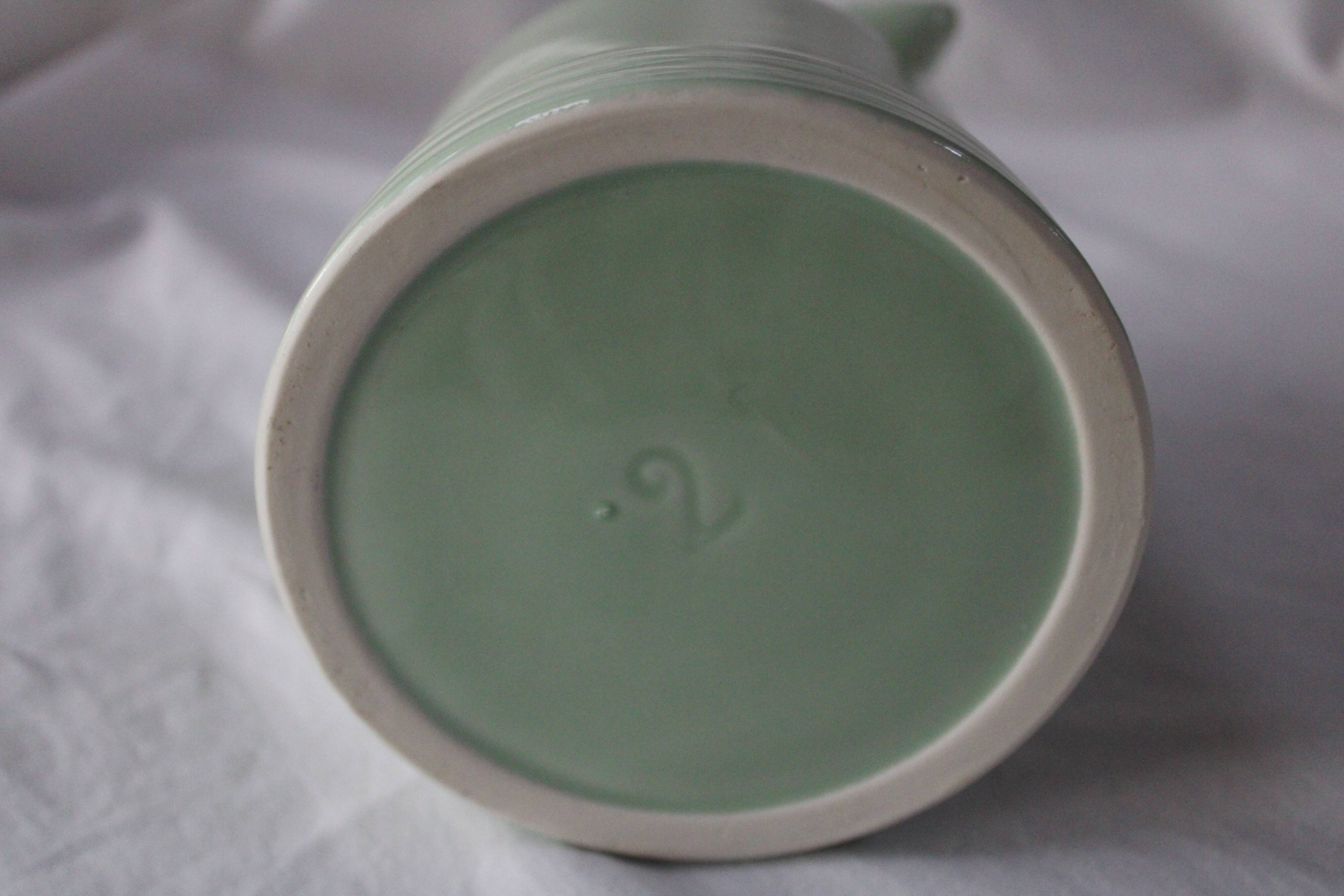 Old mint green pitcher