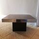 Square pedestal coffee table with mirror top