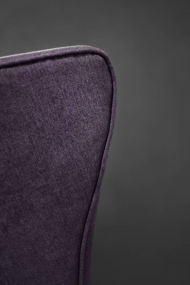 High-backed wing chair in oak and purple fabric, vintage Scandinavian style from the 1950s.