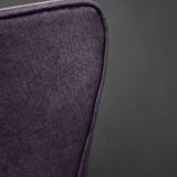High-backed wing chair in oak and purple fabric, vintage Scandinavian style from the 1950s.