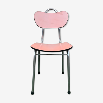 Pink chair in formica