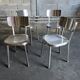 Lot de 4 chaises en acier brossé