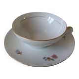 Old large tea cup and saucer in Limoges porcelain with flower decor