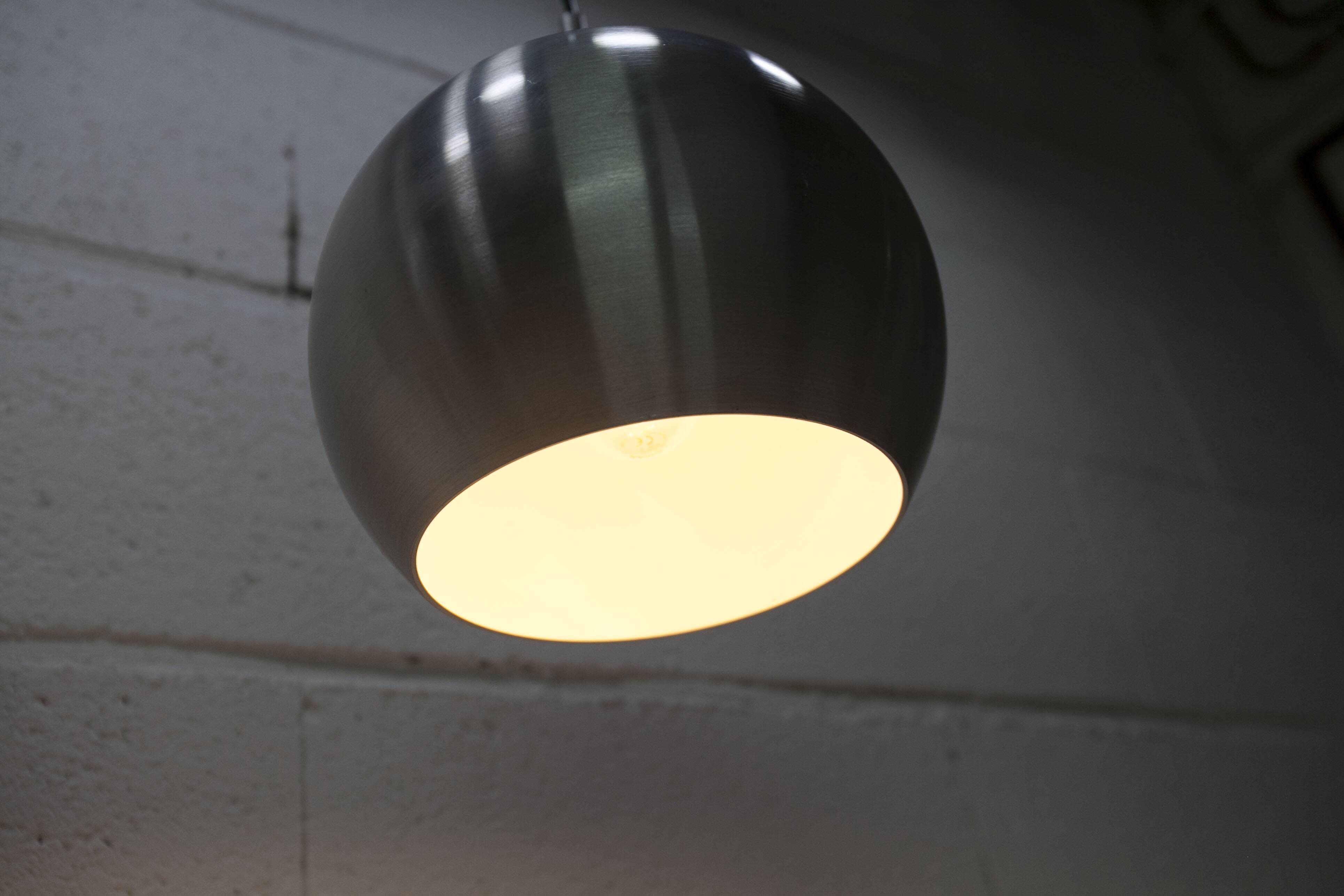 Pair of functional 70's aluminum ball pendants