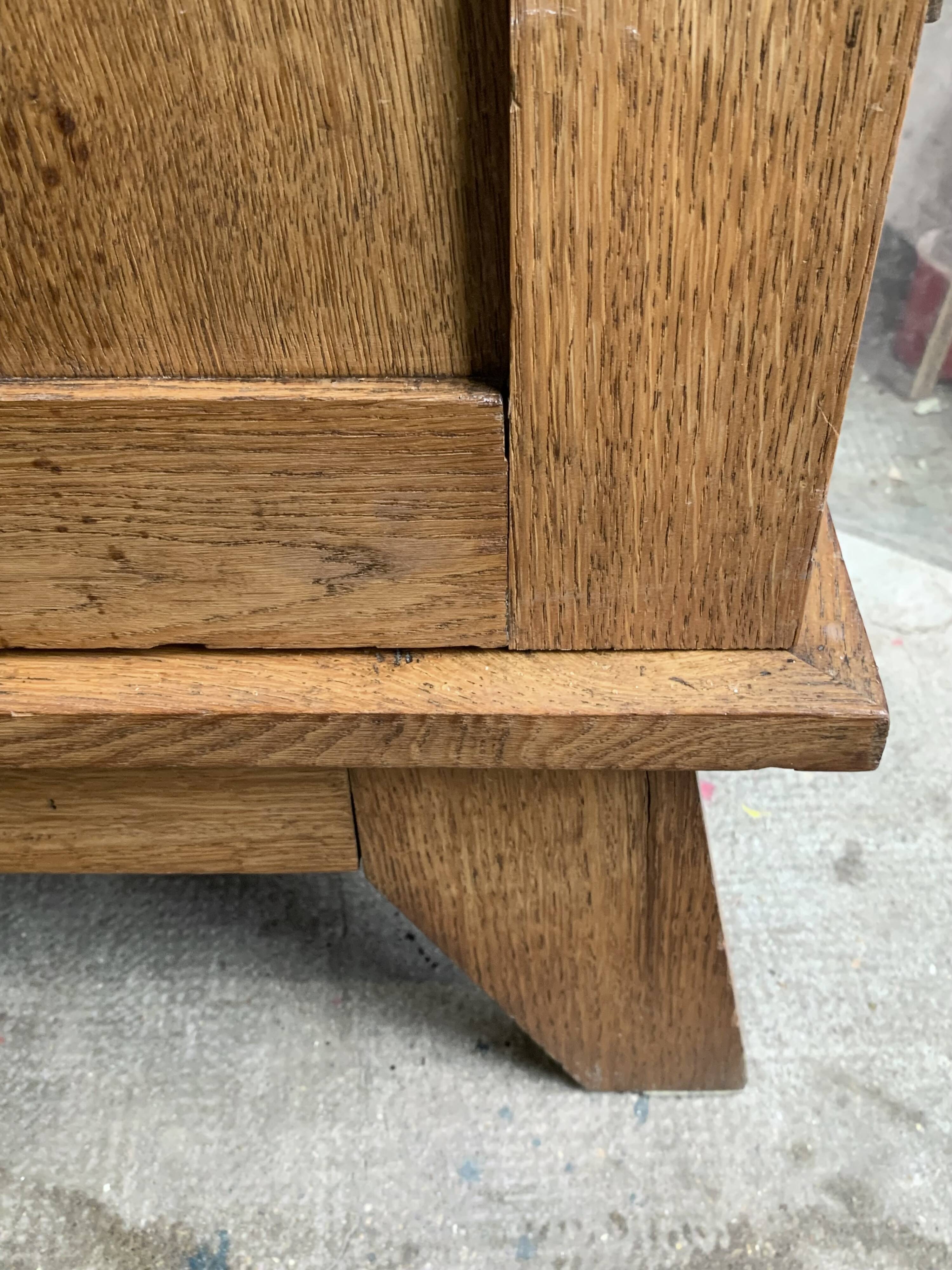 Solid oak compass foot cabinet René Gabriel 1945