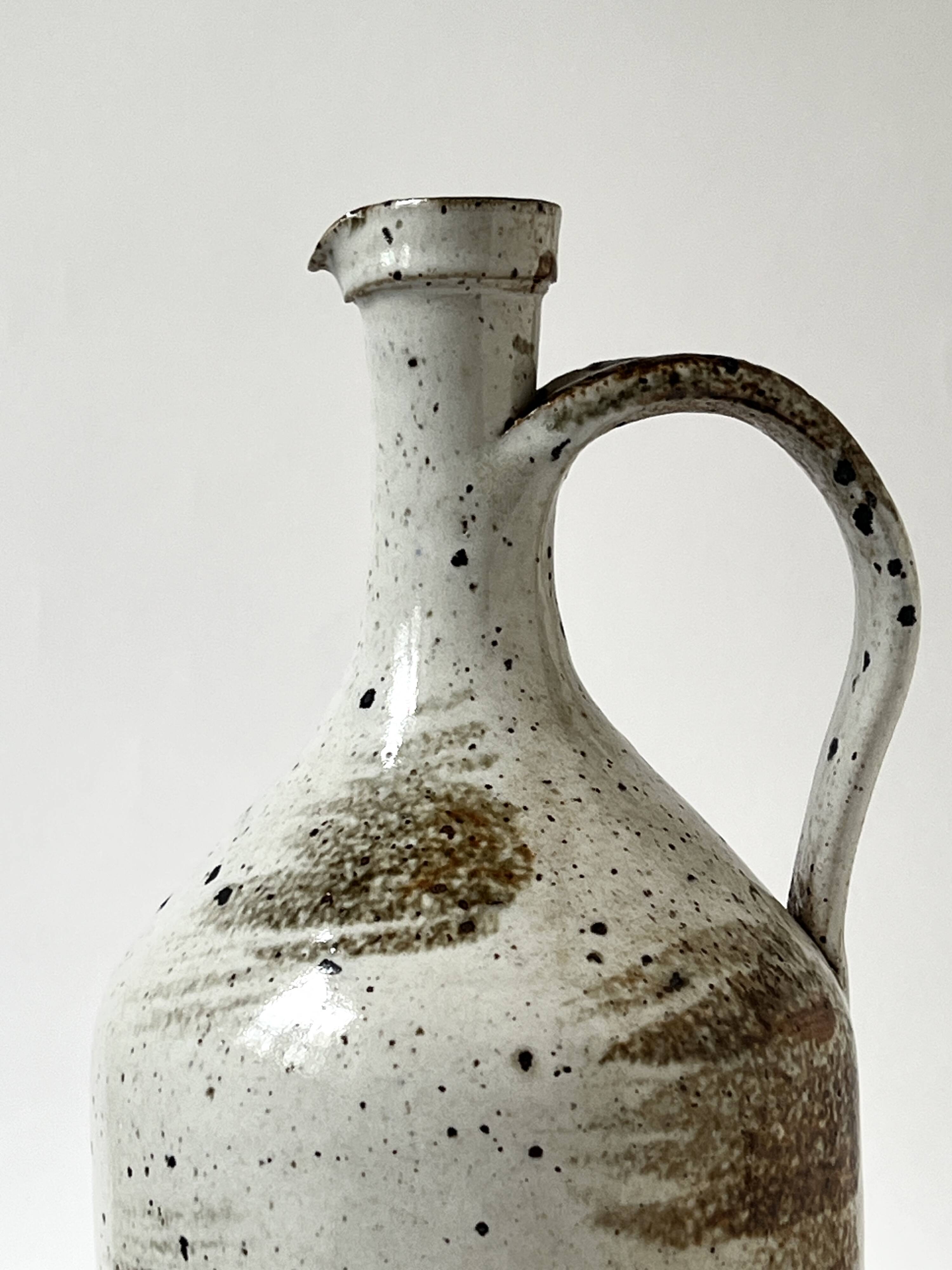 Large enamelled stoneware jug signed Albert Breton, FR Vézelay.