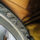 Large antique oval mirror