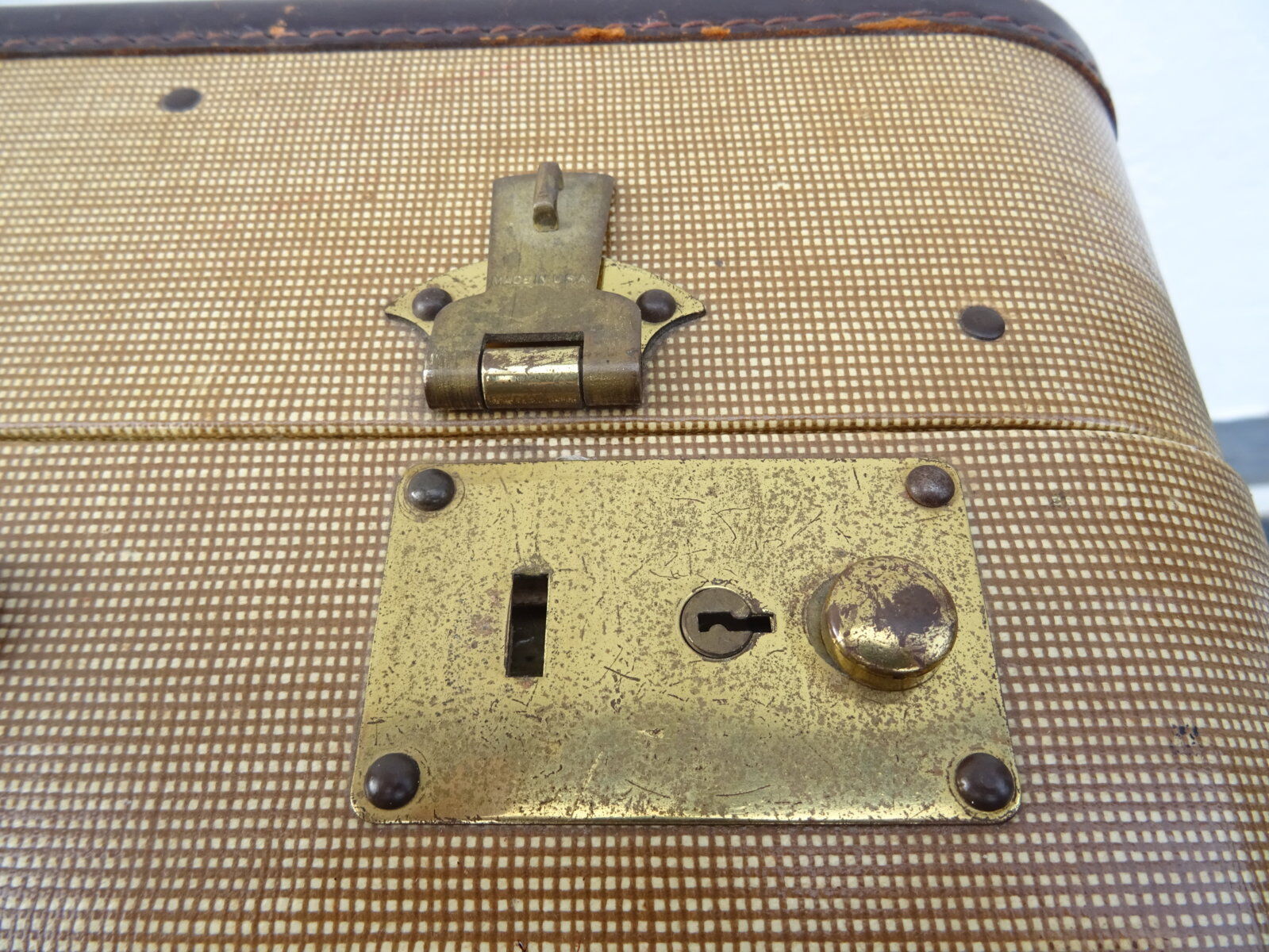 1930s Oshkosh suitcase with bakelite hangers