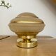 Lampe à poser globe vintage art déco en verre jaune et doré