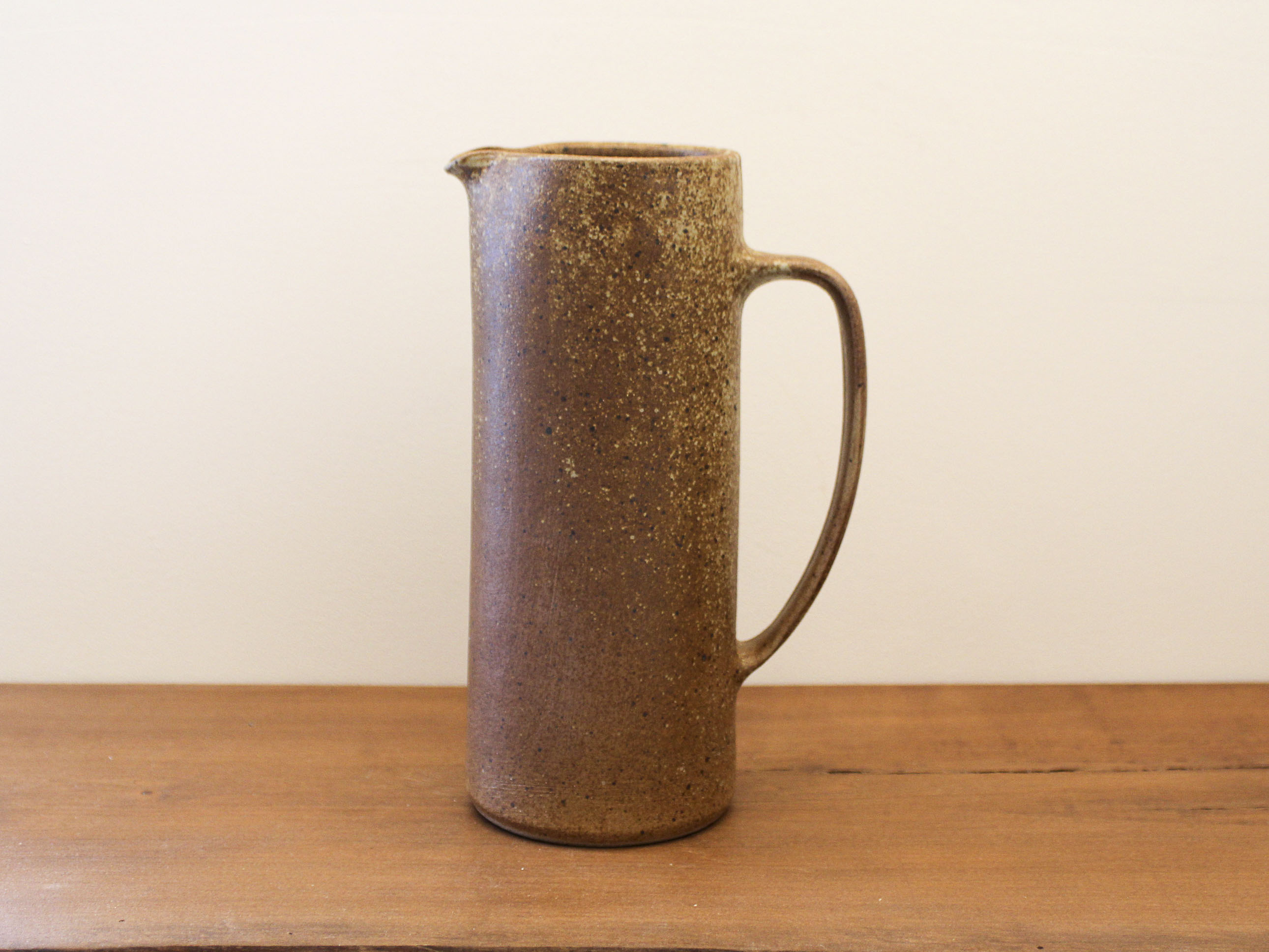 Pitcher in sandstone pyrity signed