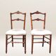 Paire de chaises volantes avec assise tapissée