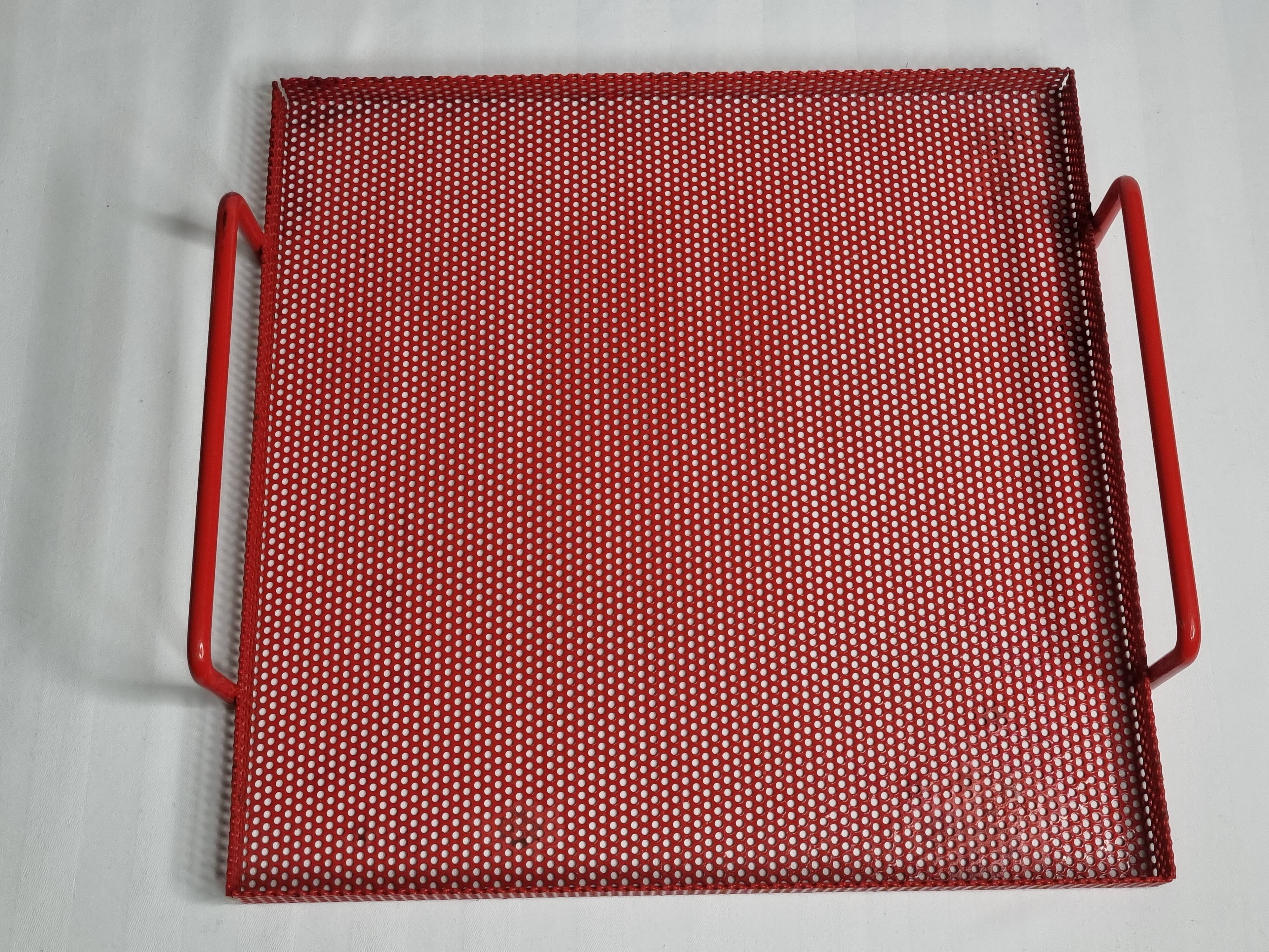 Presentation tray in red lacquered perforated metal, 80s