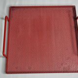 Presentation tray in red lacquered perforated metal, 80s