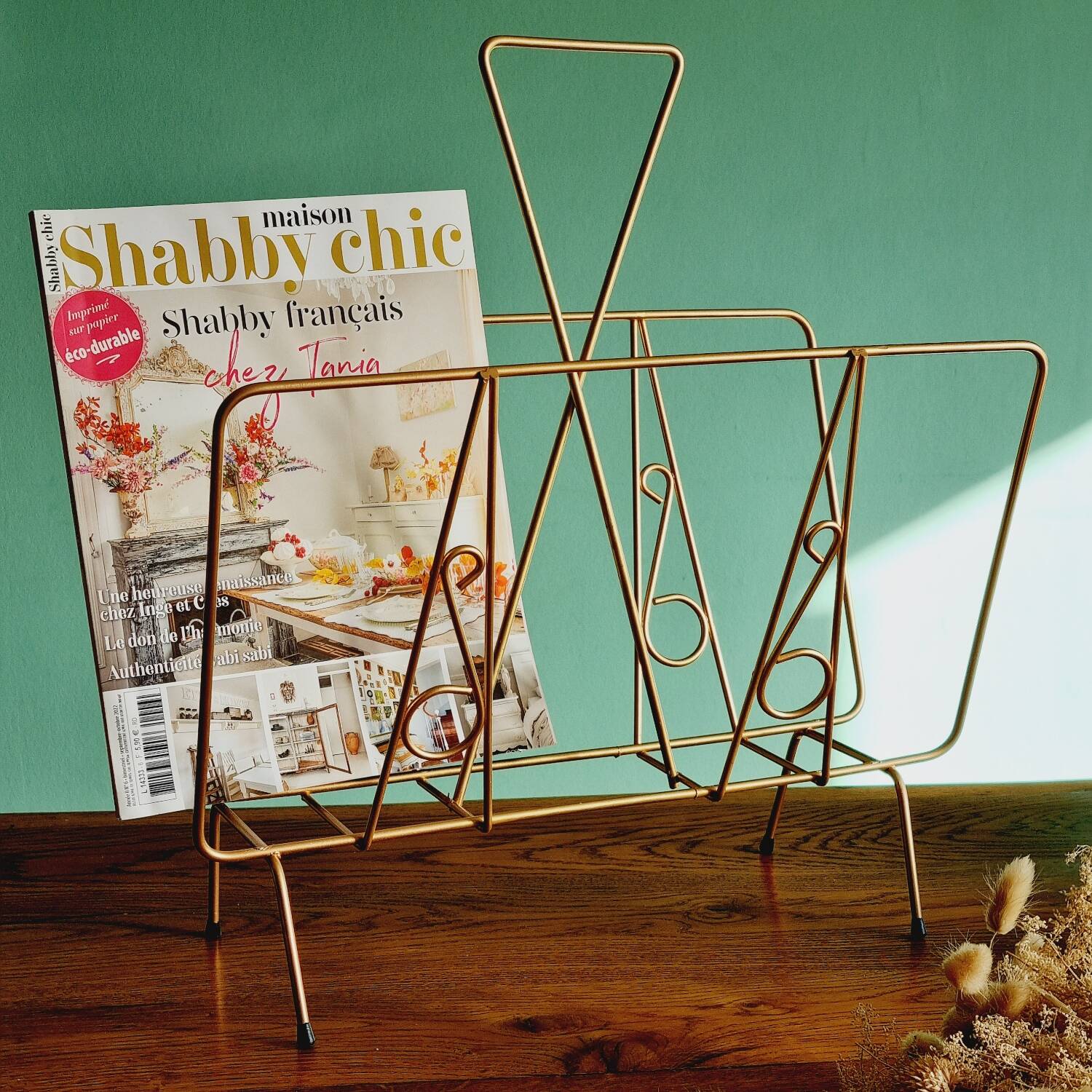 Golden metal magazine holder