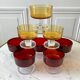 Set of 8 champagne glasses in amber colored glass and garnet 70s