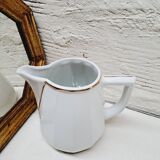 White and gold porcelain pitcher