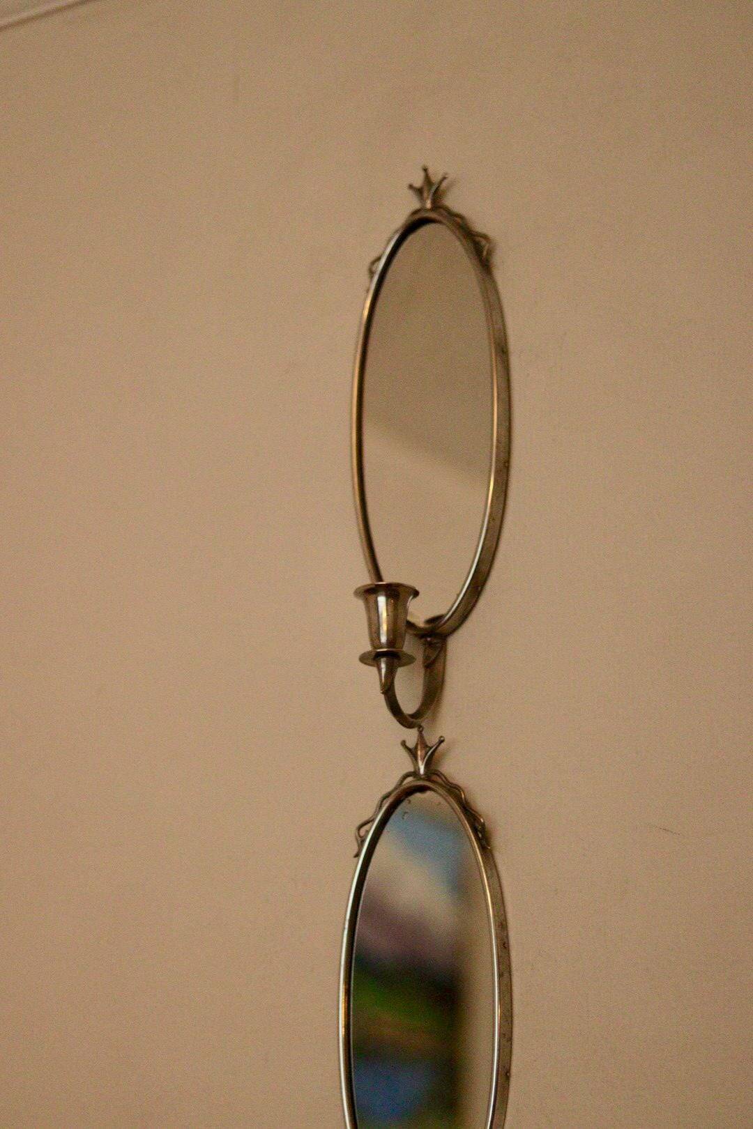 Pair of vintage mirror sconces in pewter by Svenskt Tenn