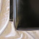 Modernist chair in chromed metal and black imitation leather