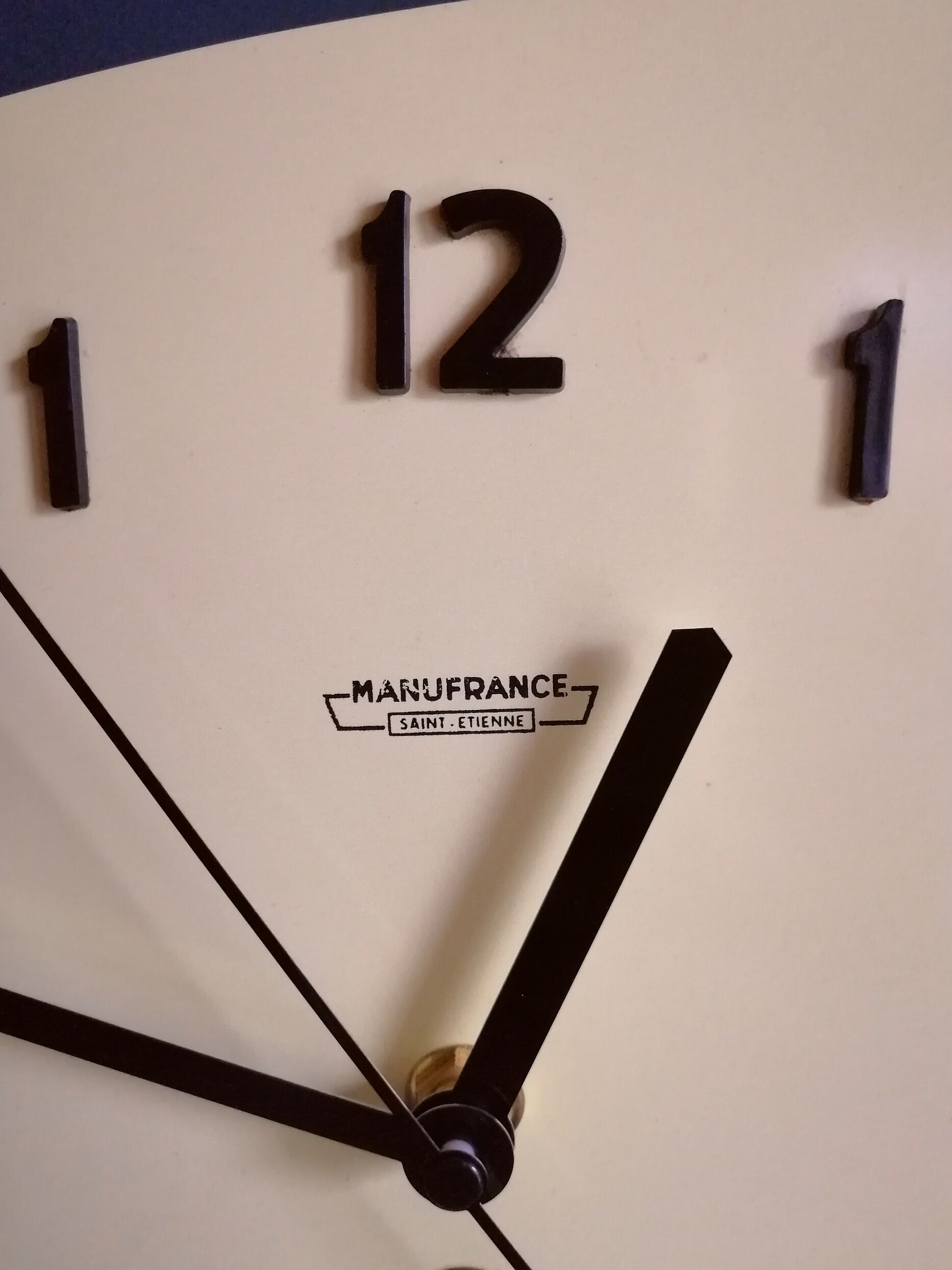 Clock formica vintage asymmetrical silent wall clock "Manufrance pale yellow"