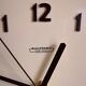 Clock formica vintage asymmetrical silent wall clock "Manufrance pale yellow"