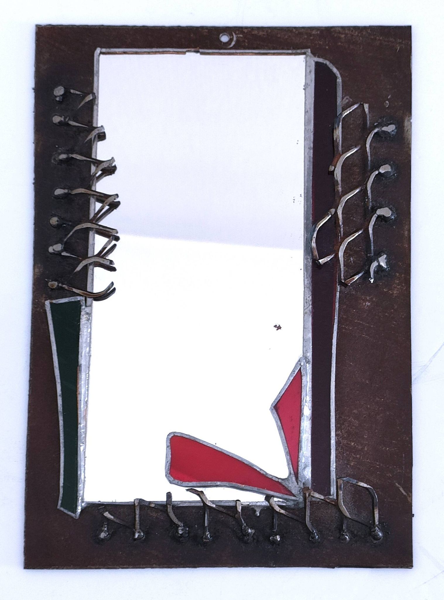Miroir brutaliste métal et verre serti