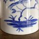 Porcelain teapot with hand-painted bird decoration