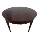 Round mahogany table with mahogany veneer and brass sabot foot.