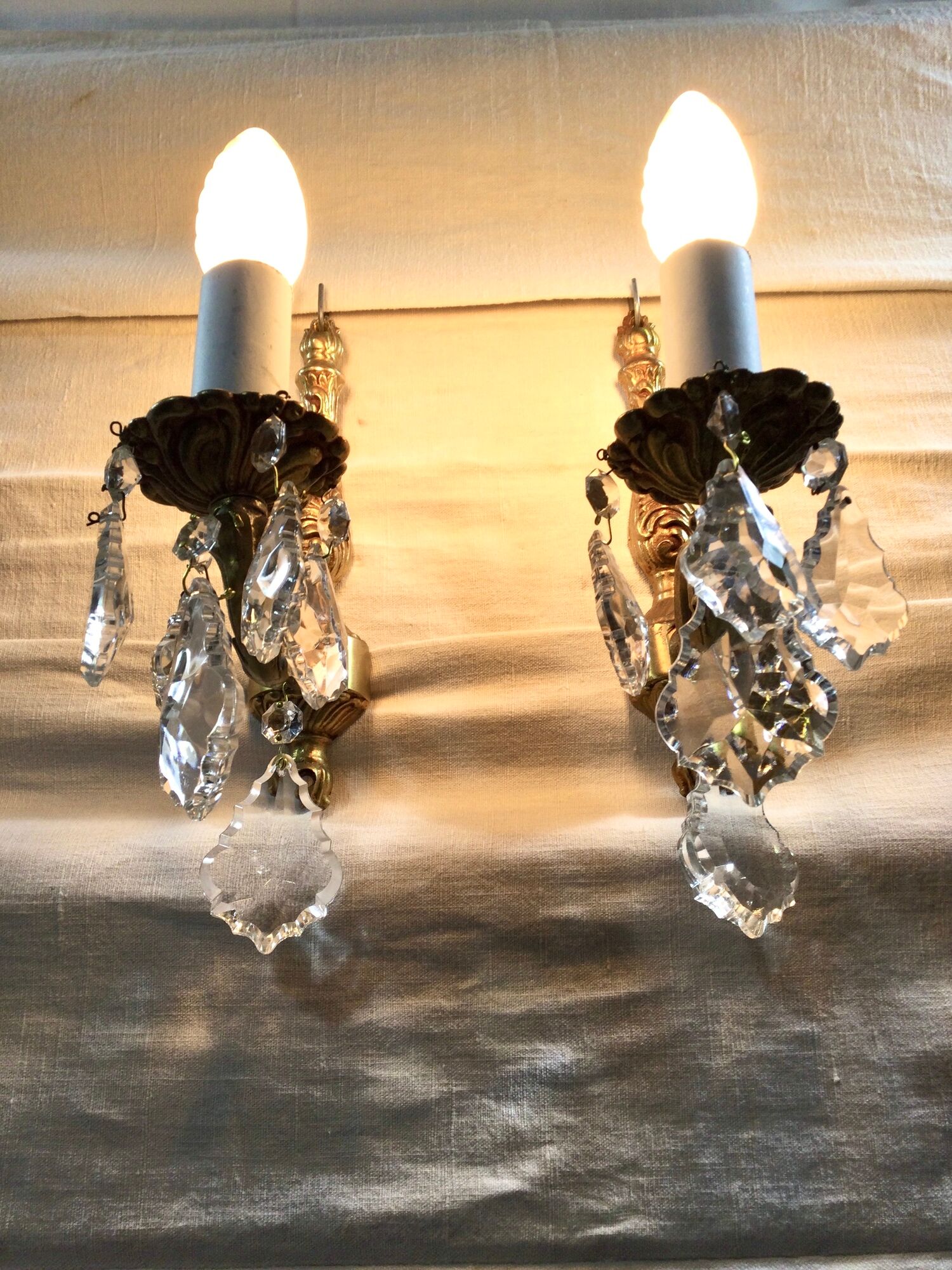 Pair of 1-light bronze sconces and Louis XV style stamps